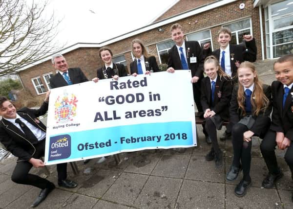 Headteacher  Colin Rainford and pupils celebrate a good Ofsted report at Hayling College     Picture: Chris Moorhouse