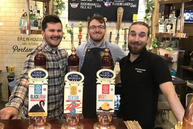 Left to right, Warren Millard, George Dummons and Oli Kutyloski from the Brewhouse & Kitchen Pub, Guildhall Walk
