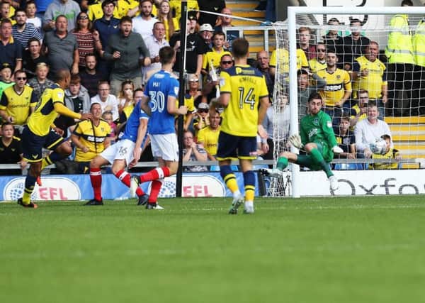 Gino van Kessel scores for Oxford United in their 3-0 win over Pompey in August. Picture: Joe Pepler