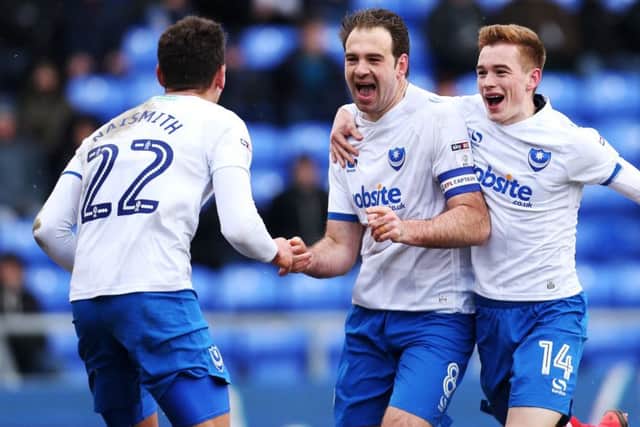 Brett Pitman celebrates scoring his second goal at Oldham. Picture: Joe Pepler
