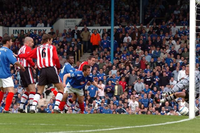 Arjan De Zeeuw scores in Pompey's 4-1 win over Southampton in 2005