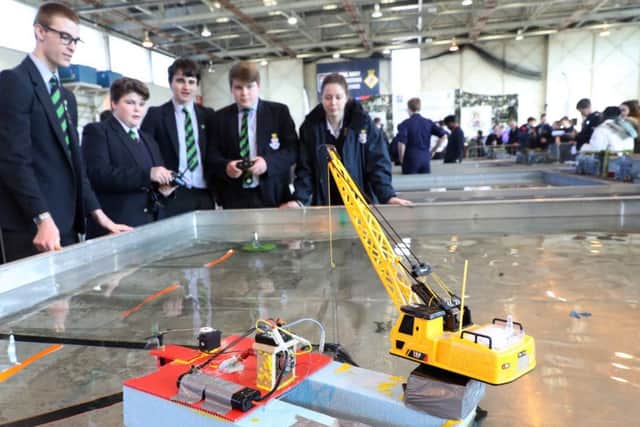 Students from the Royal Hospital School. Pictured left to right Rupert Todd, Finn Corloran, Henry Gatyton, Guy Parker and Megan Aslet-Clark Picture by PO Photographer Nicola Harper