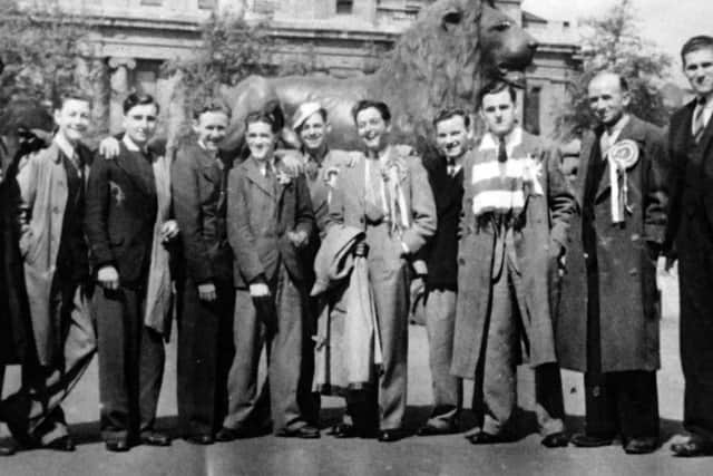 Airspeed lads up for the cup in 1942, plus a sailor friend, pose in Trafalgar Square. All in suits and ties. Picture: Len Durrant Collection