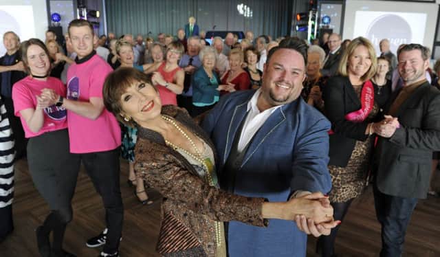 The Gaiety Bar's Jack Edwards leads the way with Anita Harris.
Picture: Ian Hargreaves