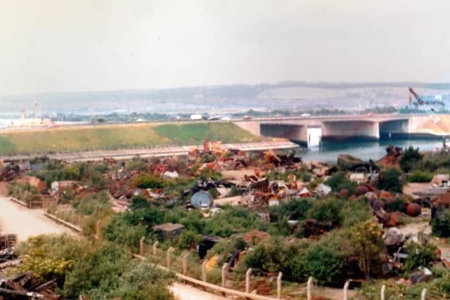 Part of Harry Pound's scrapyard at Tipnerin the 1970s with the recently constructed M275 in the background