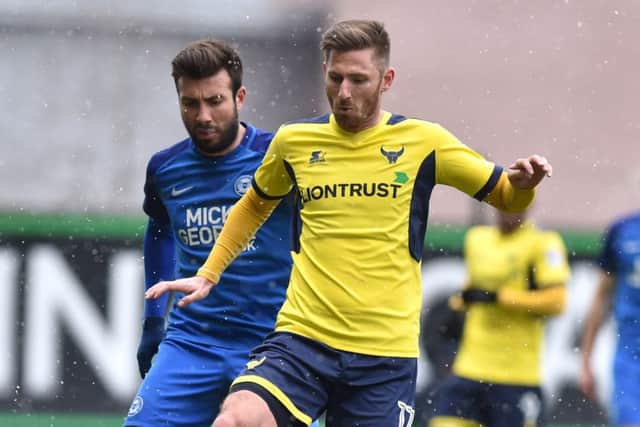 Oxfords James Henry in action against Peterborough