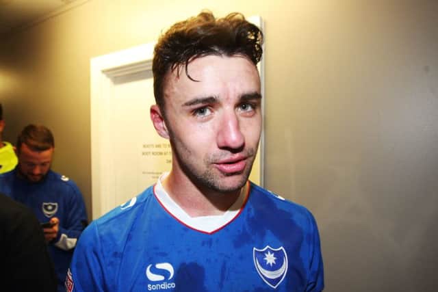 Enda Stevens pictured after Pompey secured promotion to League One at Notts County