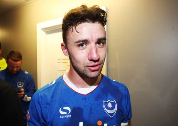 Enda Stevens pictured after Pompey secured promotion to League One at Notts County