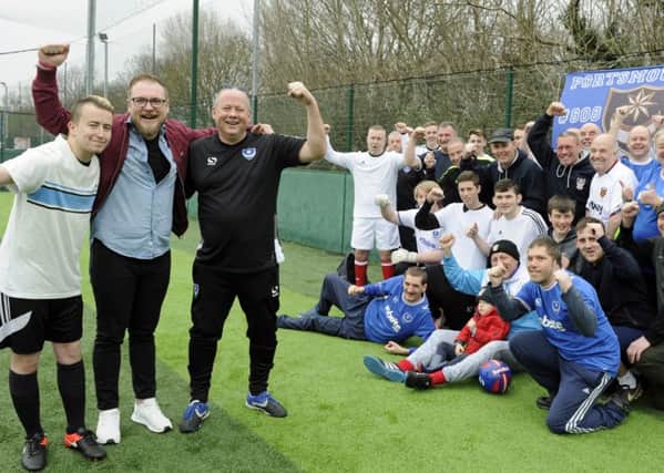 A charity football match was held to raise money for six-year-old Harry St Ledger from Portchester who is in hospital with a brain tumour. The teams with organisers Jake Smith (left), and Graham Price with (centre) Harry's dad Cairan    
Picture: Ian Hargreaves  (180439-1)