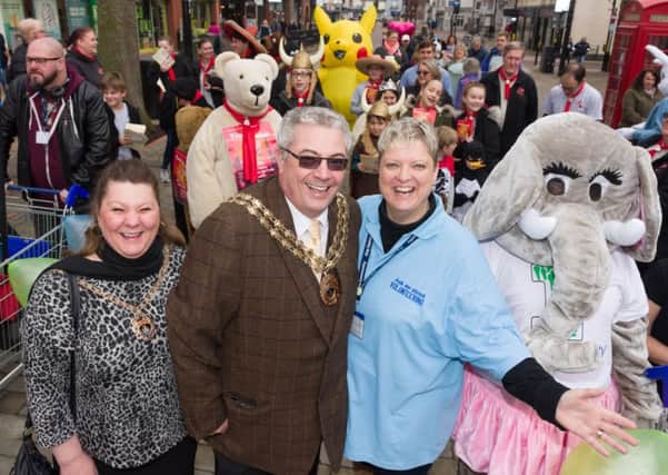 CATCH LINE: Mascot March
DATE: 24-3-2018
LOCATION: West Street, Fareham Shopping Centre
STORY: March of charity mascots through Fareham town centre to raise awareness of local charities - (L-R) Lady Mayoress Tina Fazackarley, Councillor Geoff Fazackarley (Mayor of Fareham), event organiser Hayley Hamlett, Marilyn White of 'One Community' lead off the mascot march.
PICTURE: Duncan Shepherd PPP-180324-185634006