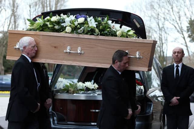 Billy Wilson's coffin is borne into the chapel Picture: Chris Moorhouse