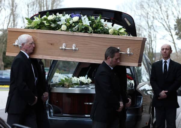 Billy Wilson's coffin is borne into the chapel Picture: Chris Moorhouse