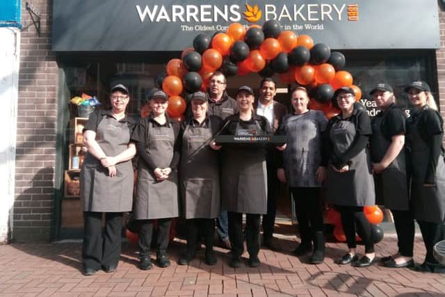 Ali Rupani, middle, with the staff at the new Warrens Bakery in Gosport High Street. Picture: David George PPP-180703-115303001