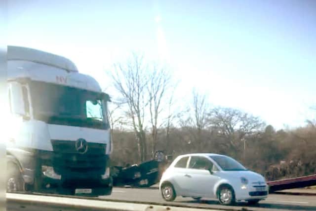 A car flipped on to its roof in the crash