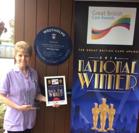 Gill Clements, care assistant at Westholme Residential and Nursing Home with her award. Picture: Supplied