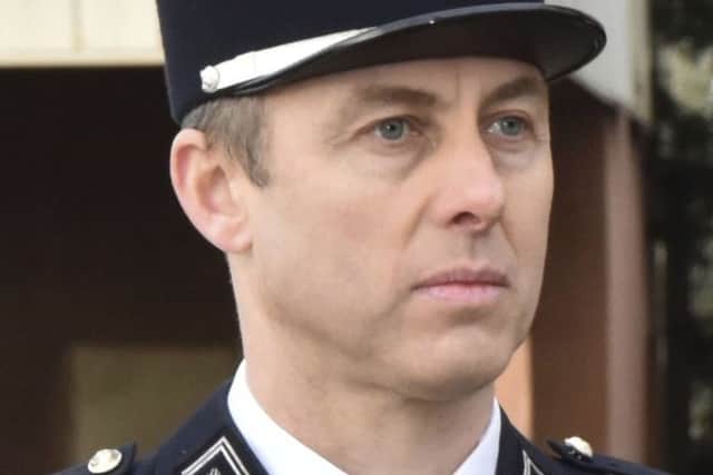 This image posted on Saturday, March 24, 2018 by the Gendarmerie Nationale on it's Facebook account shows a portrait of Lieutenant Colonel Arnaud Beltrame. A French police officer who offered himself up to an extremist gunman in exchange for a hostage has died of his injuries, the interior minister said Saturday. (Gendarmerie Nationale via AP) FRANCE_Shooting_074716.JPG