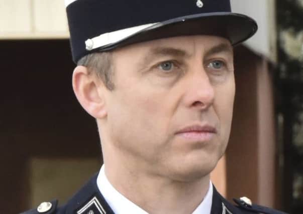 This image posted on Saturday, March 24, 2018 by the Gendarmerie Nationale on it's Facebook account shows a portrait of Lieutenant Colonel Arnaud Beltrame. A French police officer who offered himself up to an extremist gunman in exchange for a hostage has died of his injuries, the interior minister said Saturday. (Gendarmerie Nationale via AP) FRANCE_Shooting_074716.JPG