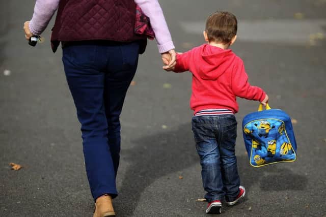 MPs say some parents on low-incomes will be missing out. Photo: Lawless/PA Wire POLITICS_Childcare_072306.JPG