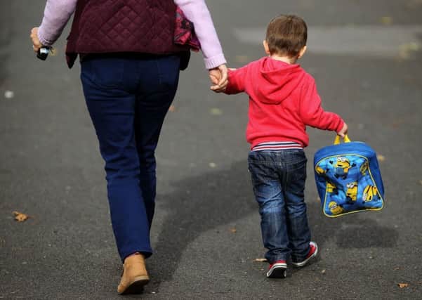 MPs say some parents on low-incomes will be missing out. Photo: Lawless/PA Wire POLITICS_Childcare_072306.JPG
