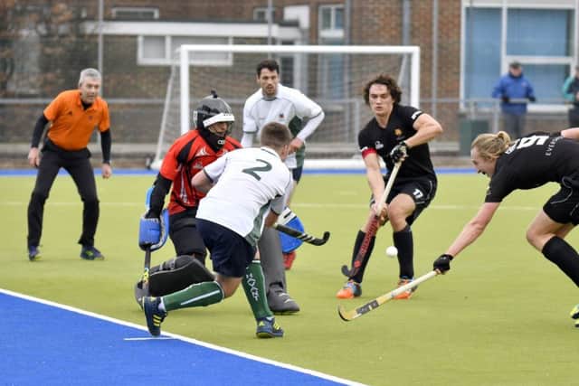 Matt Boote crosses for Adam Bloomfield to score Havant's third goal against Cardiff Met.  Picture: Neil Marshall