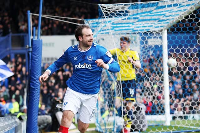 Brett Pitman celebrates his second goal against Oxford