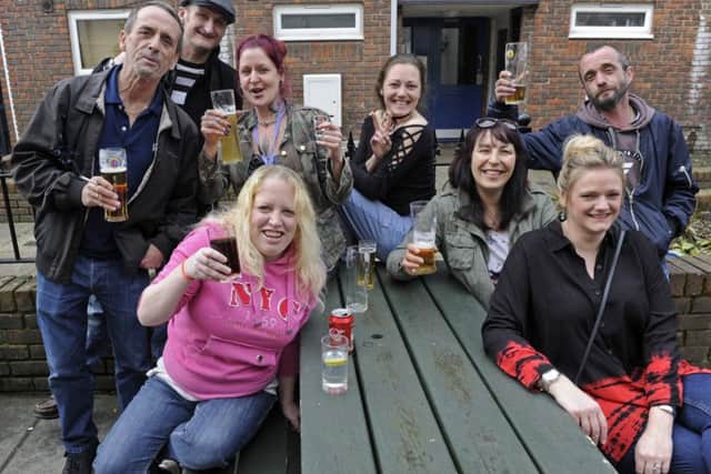 Friends raise a glass at a fund-raising afternoon at The Fox Tavern in Gosport to raise money for the funeral of Royal Navy veteran Raymond Daniels Picture: Ian Hargreaves (180441-1) PPP-180325-161610006