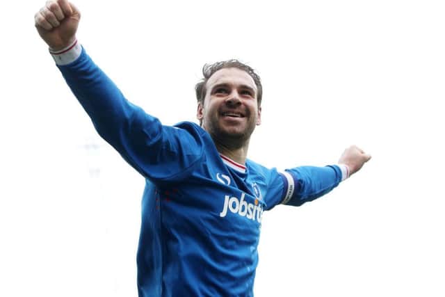 Brett Pitman celebrates his second goal against Oxford United Picture: Joe Pepler