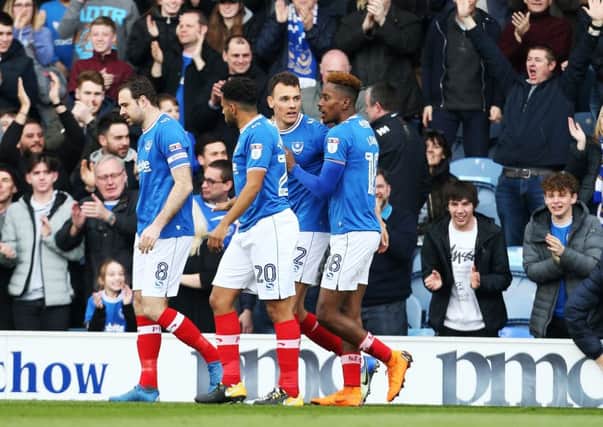 Pompey celebrate the opening goal from Kal Naismith. Picture: Joe Pepler