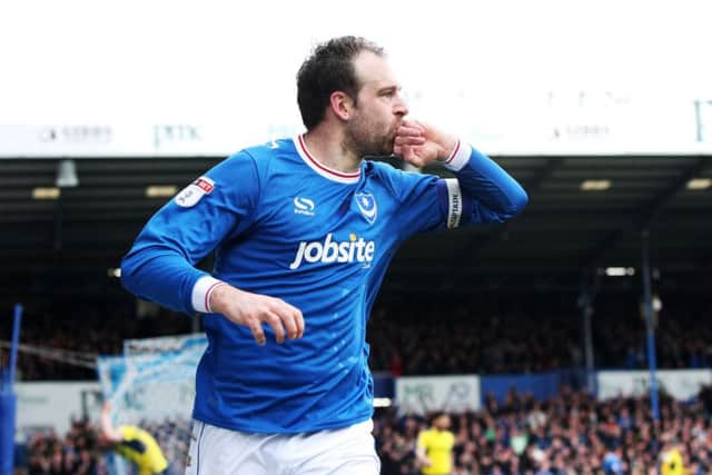 Brett Pitman celebrates his first goal against Oxford United. Picture: Joe Pepler