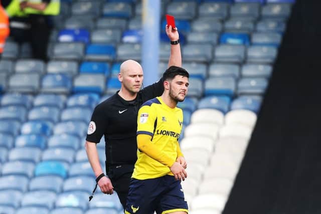 Alex Mowatt is dismissed for Oxford against Pompey. Picture: Joe Pepler