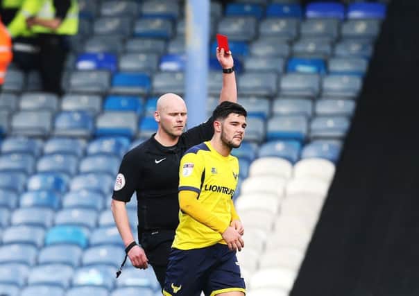 Alex Mowatt is dismissed for Oxford against Pompey. Picture: Joe Pepler