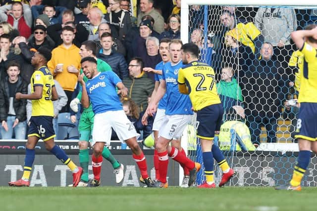 Nathan Thompson goes down after being struck by Alex Mowatt.