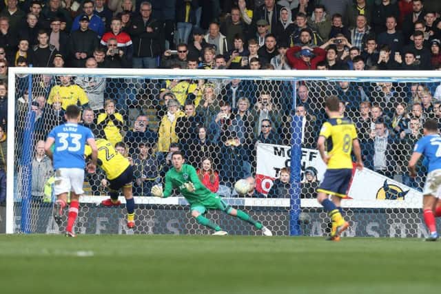Oxford United's Alex Mowatt missed his 63rd-minute penalty before getting sent off