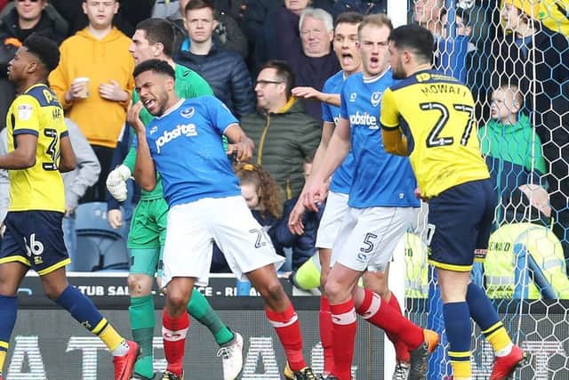 Nathan Thompson, left, goes down after Alex Mowatt, right, slapped him in the face