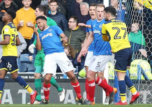 Nathan Thompson, left, goes down after Alex Mowatt, right, slapped him in the face