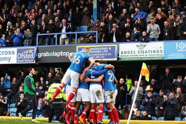 Pompey celebrate Brett Pitman's first goal against Oxford United. Picture: Joe Pepler