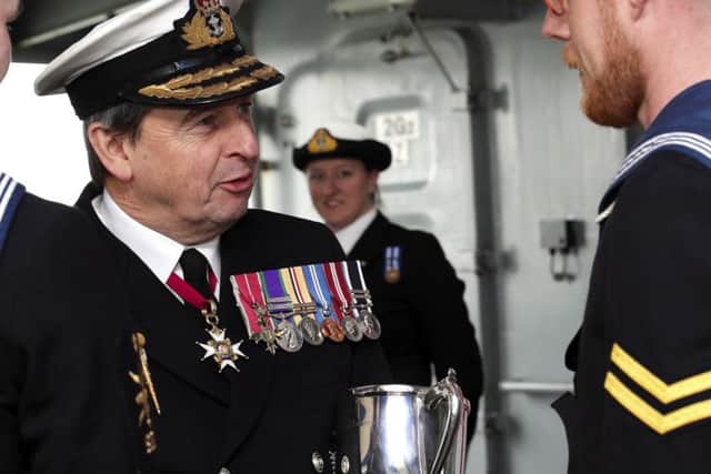 Vice Admiral Jonathan Woodcock talking to AB (Seaman Specialist) Chris Mackins. Picture: LPhot Louise George