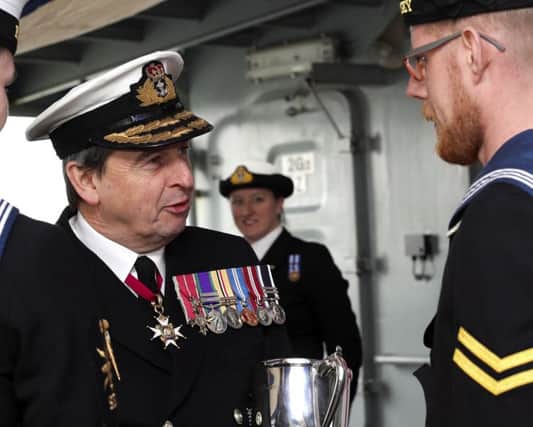 Vice Admiral Jonathan Woodcock talking to AB (Seaman Specialist) Chris Mackins. Picture: LPhot Louise George