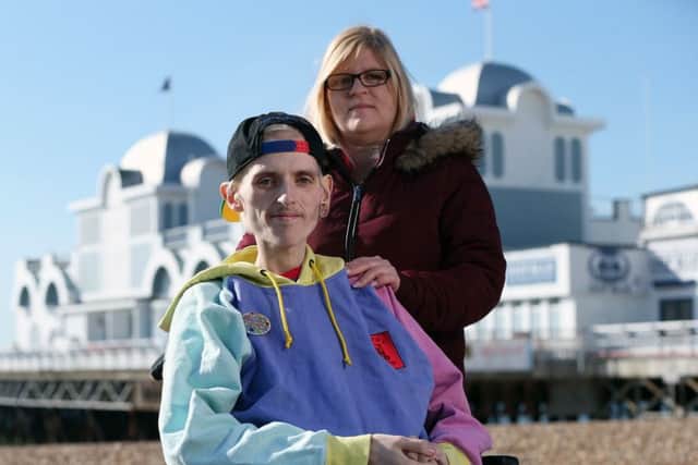 Karl Skinner on his 19th birthday pictured with his mother, Claire Skinner, at South Parade Pier, Southsea. Karl has been collecting successfully for CLIC Sargent, the cancer charity which has helped him Picture: Chris Moorhouse