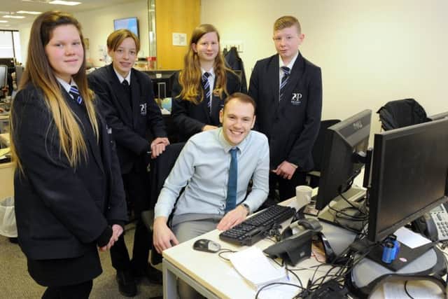 Year 9 students from Priory School in Portsmouth with senior sports writer Will Caddy.  From left: Isabella Kendall, Tyler Gaffney, Isobel Hecks and Tyler Glasbey     Picture: Malcolm Wells (180320-1120)
