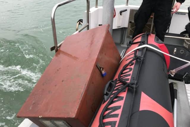The box was recovered from the River Itchen by police. Picture: @HantspolMarine