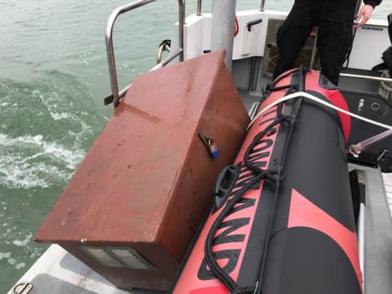 The box was recovered from the River Itchen by police. Picture: @HantspolMarine