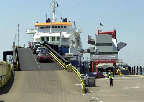 Ferry Port.13-06-01.013063-2.photo ian hargreaves.
A freight lorry leaves The Pride of Le Havre cross channel ferry after berthing at Portsmouth's Continental Ferry Port. MAYOAK0003133577