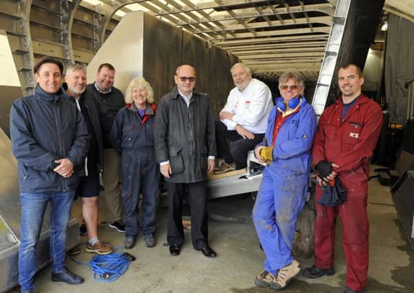 Richard Luxmore, fifth from left, the founder of FundSecure with sixth from the left Alan Priddy at The Aluminium Boatbuilding Company on Hayling Island Picture: Malcolm Wells (180327-2163)