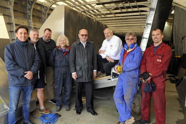 Richard Luxmore, fifth from left, the founder of FundSecure with sixth from the left Alan Priddy at The Aluminium Boatbuilding Company on Hayling Island Picture: Malcolm Wells (180327-2163)