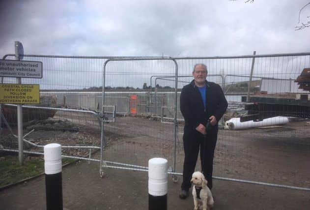 Robert Parker, of Barham Way, Portsmouth, says flood defence work is necessary at the coastal footpath in Tipner     Picture: Steve Deeks