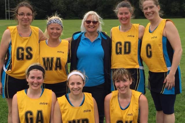 Judy Yoxall, back centre, with members of Springers
