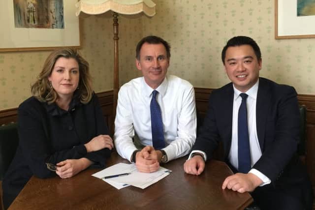 Health and social care secretary Jeremy Hunt, centre, with Portsmouth North MP Penny Mordaunt, left, and Havant MP Alan Mak, right