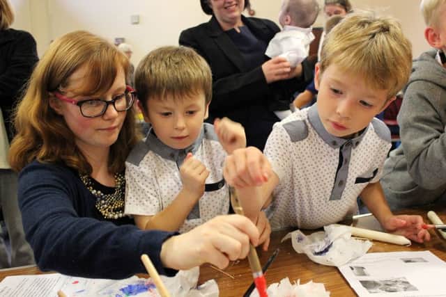 A family enjoying art and craft at Church of the Good Shepherd, Crookhorn