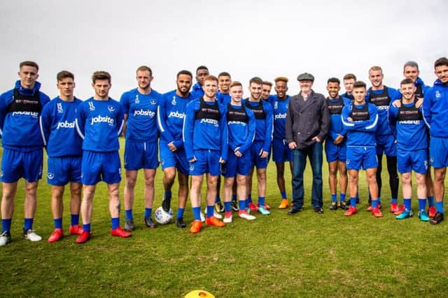 Hero Steve Chamberlain (centre) met the Pompey squad during their training session on Friday